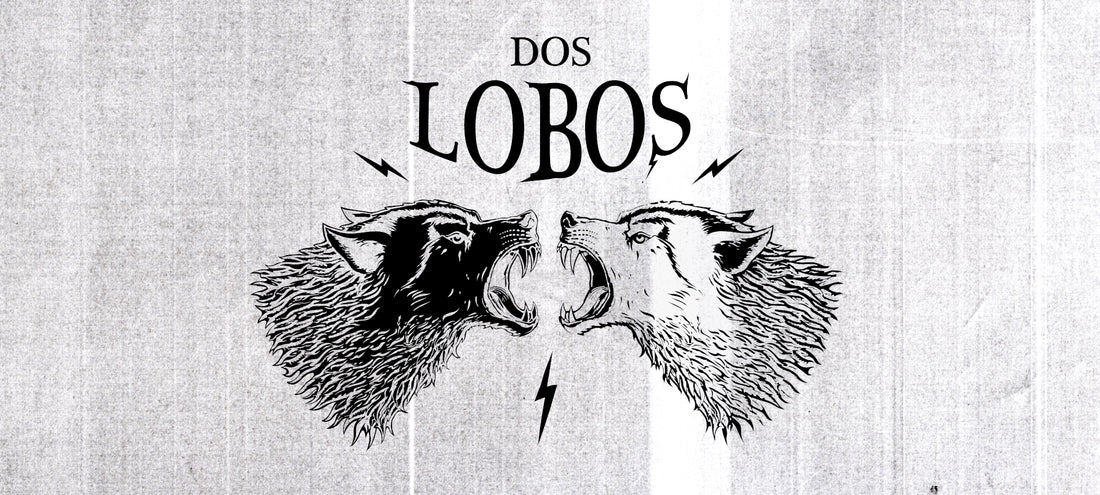 Dos Lobos - Two Wolves Facing Off Black Wolf White Wolf